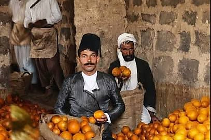 A fruit merchant in the old Jaffa marketplace